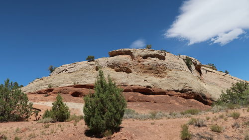 Built structure on rock against sky