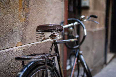 Bicycle leaning against wall