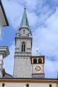 Low angle view of clock tower against sky