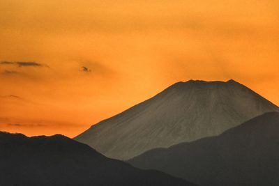 Scenic view of mountain against sky during sunset