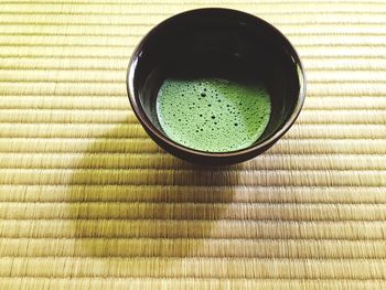 Close-up of green matcha tea on table