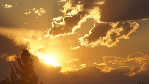 Scenic view of cloudy sky at sunset