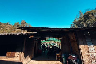 Exterior of old building against clear blue sky