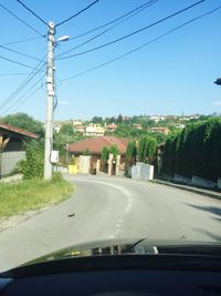 Road seen through car windshield