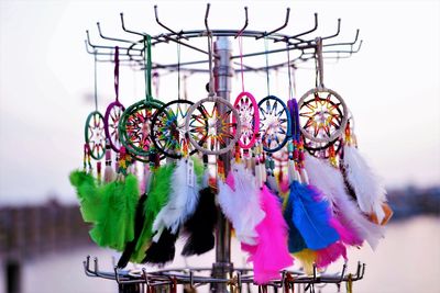 Close-up of multi colored decoration hanging outdoors