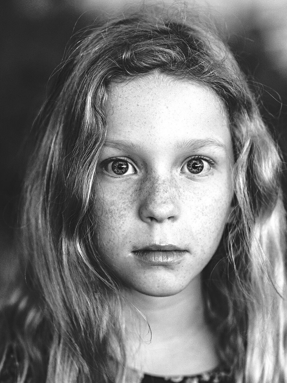 looking at camera, portrait, real people, close-up, front view, one person, headshot, focus on foreground, young women, young adult, day, outdoors