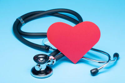 Close-up of heart shape against blue background