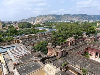 High angle view of buildings in city jaipur pink city of india this place is called hawa mahal 