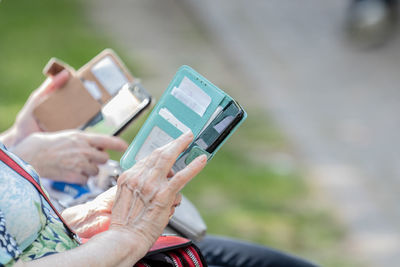 Man photographing with mobile phone