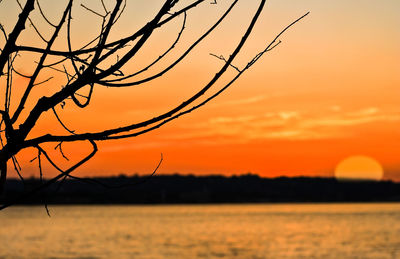 Scenic view of sunset over calm sea