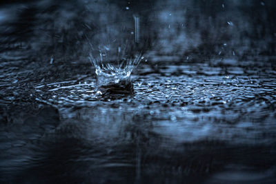 Close-up of water splashing in lake