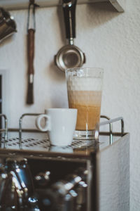 Close-up of coffee cup on table