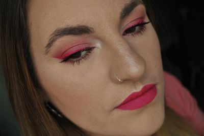 Close-up of beautiful young woman with make-up