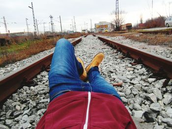 Low section of man on railroad track