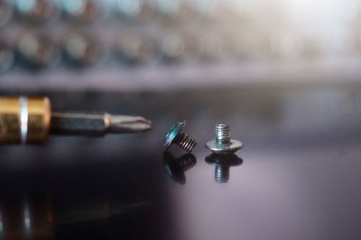 Close-up of guitar on table