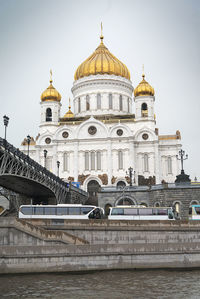 View of buildings against cloudy sky