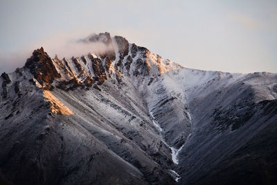 Scenic view of rocky mountains against sky