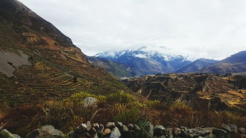 Scenic view of rocky mountains against sky