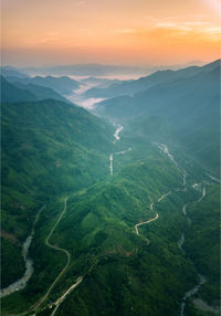 Aerial view of landscape against sky during sunset