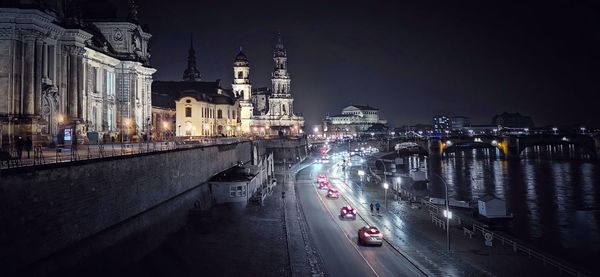 Illuminated buildings in city at night