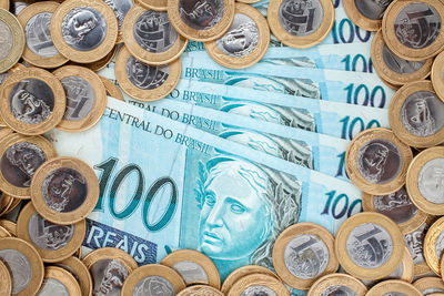 Close-up view of coins on table