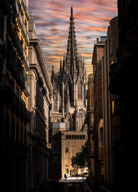 Panoramic view of buildings in city against sky during sunset