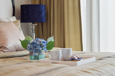 Coffee cup on table at home