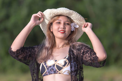 Young woman wearing hat