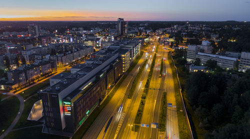 High angle view of illuminated cityscape at night