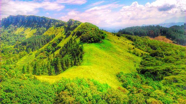 mountain, tranquil scene, tranquility, scenics, tree, beauty in nature, green color, nature, sky, landscape, growth, lush foliage, non-urban scene, idyllic, forest, green, mountain range, cloud - sky, cloud, valley