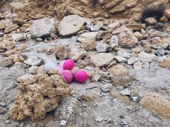 High angle view of balloons on rock