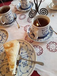 High angle view of dessert with tea on table