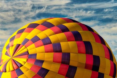 Low angle view of hot air balloons against sky