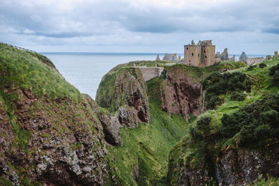 Panoramic view of sea and buildings against sky