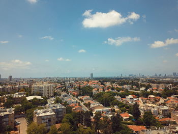 High angle shot of townscape against sky