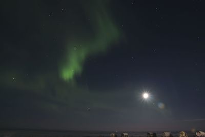 Scenic view of sea at night