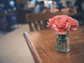 Close-up of flower vase on table