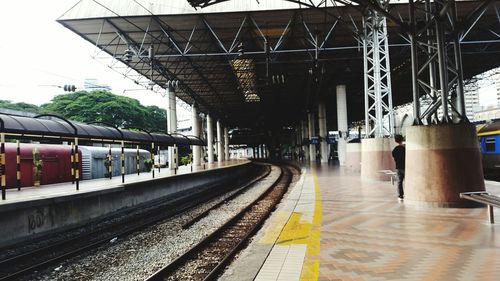 Railroad tracks on railroad station platform