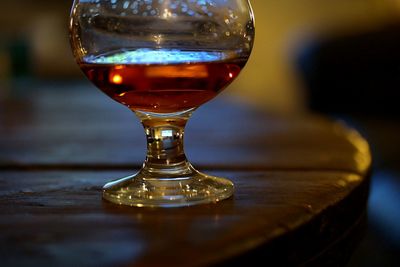 Close-up of beer glass on table