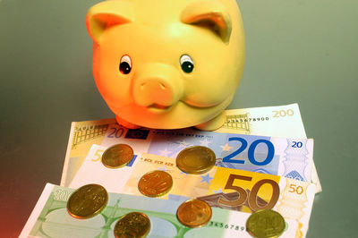 Close-up of coins on table