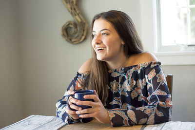 Young woman using mobile phone