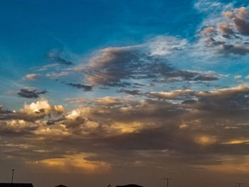 Low angle view of cloudy sky during sunset