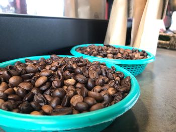 Close-up of coffee beans on table