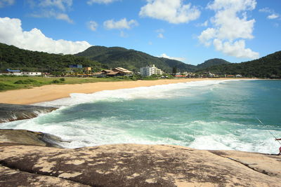 View of calm beach against the sky