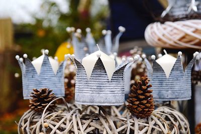 Close-up of christmas decorations on wood