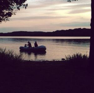 Scenic view of lake at sunset