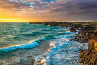 Scenic view of sea against sky during sunset