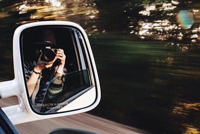 Cropped image of car on road