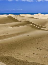 Scenic view of desert against sky