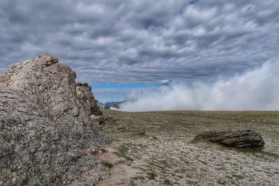 Scenic view of rocky landscape against sky